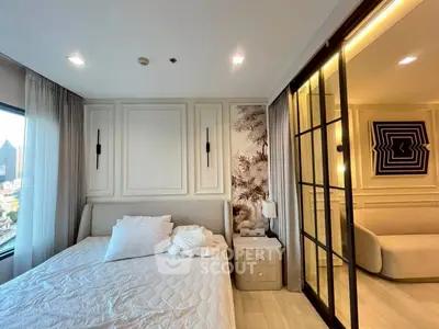 Luxurious bedroom with elegant decor and city view, featuring a cozy bed and stylish sliding doors.