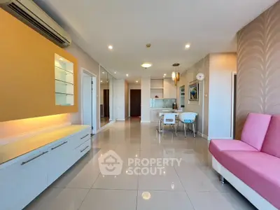 Spacious modern living room with sleek design and vibrant accents