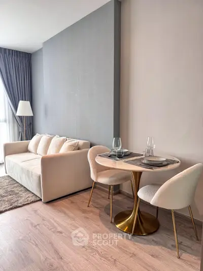 Modern living room with elegant dining area and cozy sofa in stylish apartment