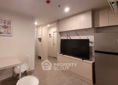 Modern living room with sleek TV unit and stylish decor