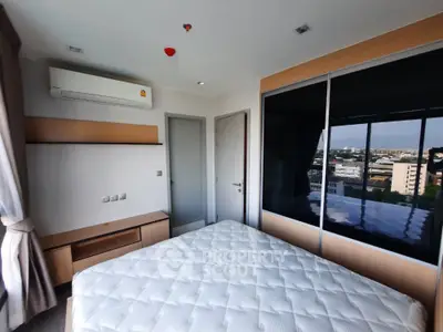 Modern bedroom with city view and air conditioning in high-rise apartment