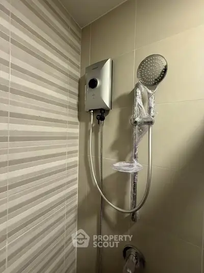 Modern bathroom shower with sleek design and tiled walls