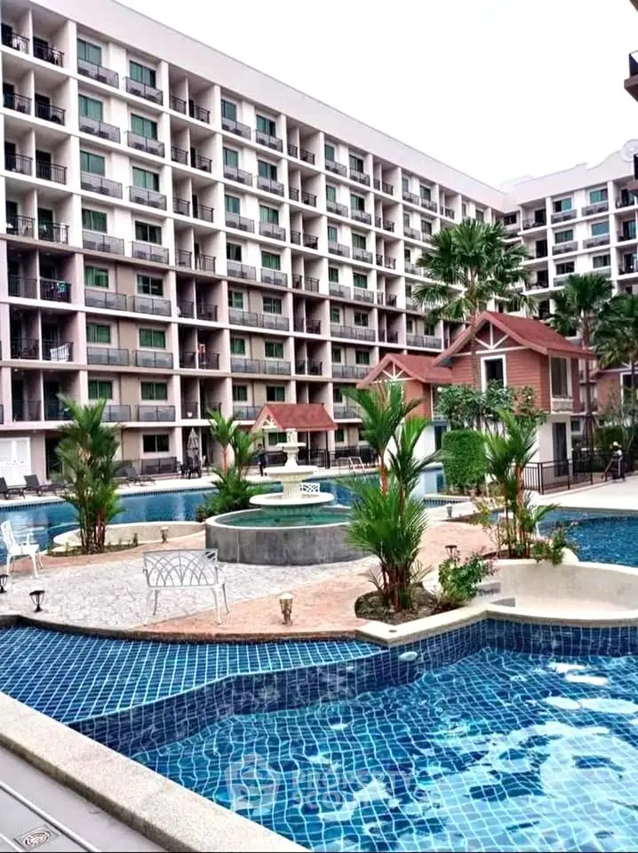 Luxurious condominium with stunning pool and lush landscaping