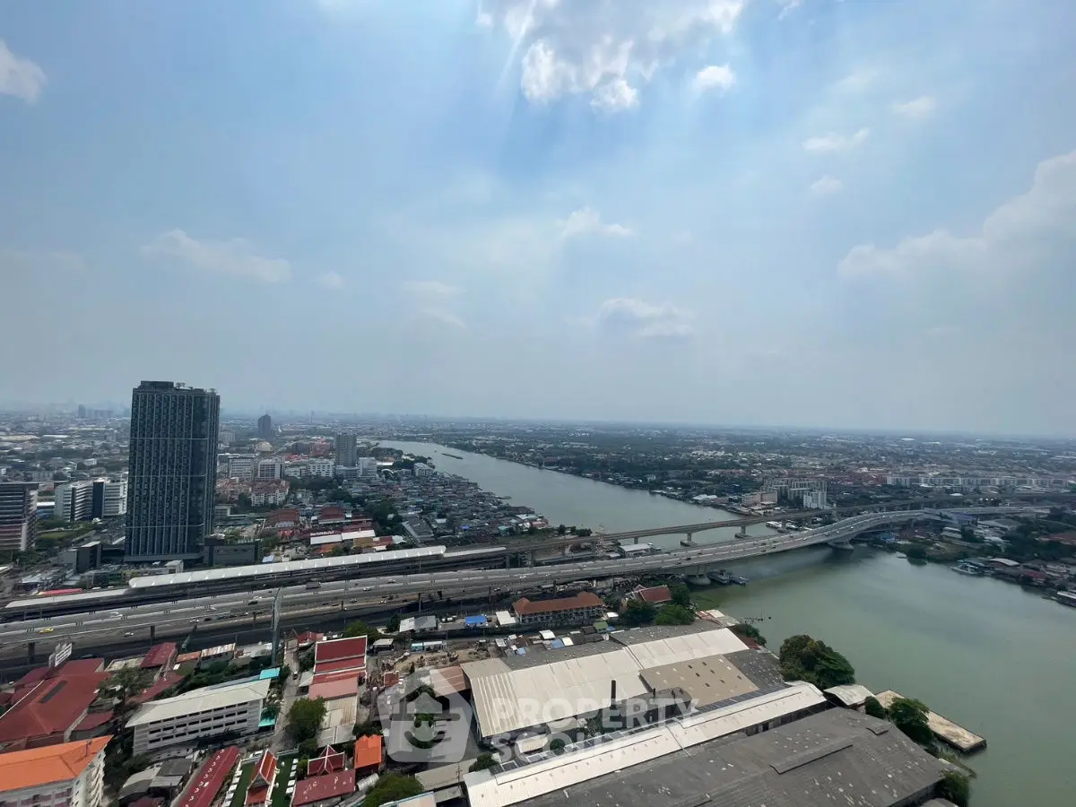 Stunning cityscape view with river and skyline from high-rise building