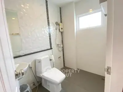 Modern bathroom with sleek design and natural light