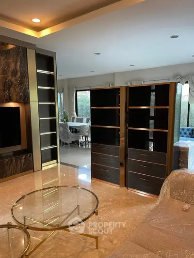 Luxurious living room with modern decor and elegant marble flooring