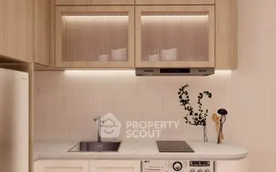 Modern kitchen with sleek appliances and elegant cabinetry