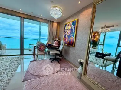 Luxurious living room with stunning ocean view and elegant decor