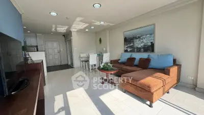 Spacious living room with modern furniture and natural light