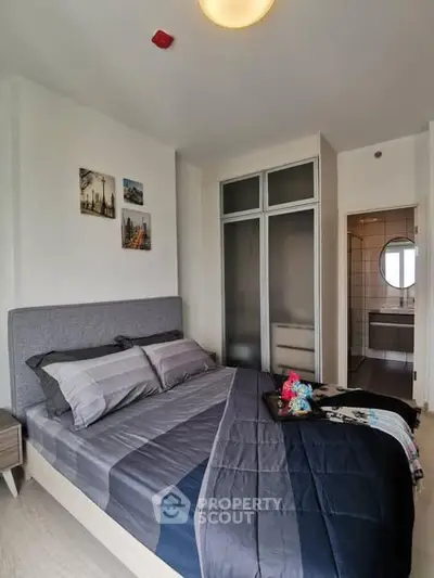 Modern bedroom with ensuite bathroom and stylish decor