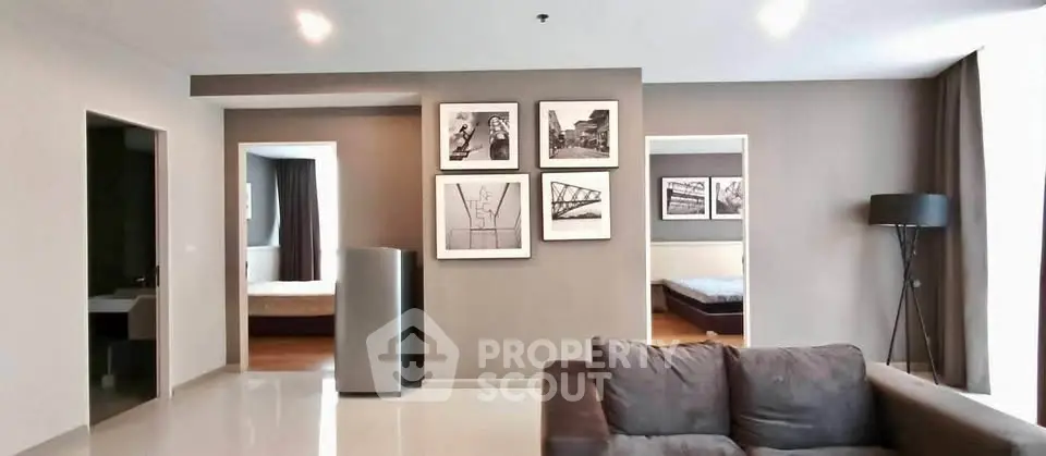 Spacious modern living room with stylish decor and natural light