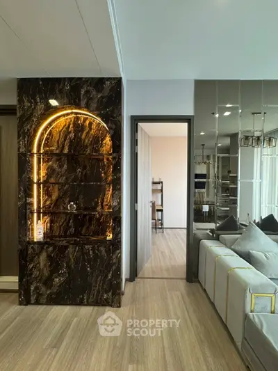 Luxurious modern living room with elegant marble feature wall and stylish decor