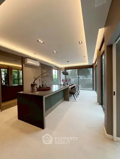Luxurious modern kitchen with sleek island and ambient lighting