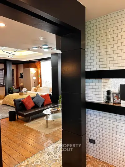 Stylish open-plan living room with modern decor and cozy ambiance