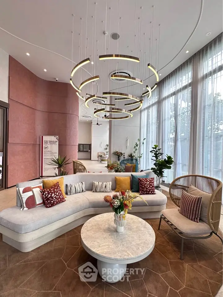 Luxurious modern living room with stylish furniture and unique lighting fixtures