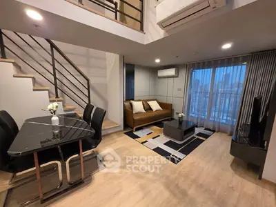 Modern duplex living room with stylish furniture and open layout