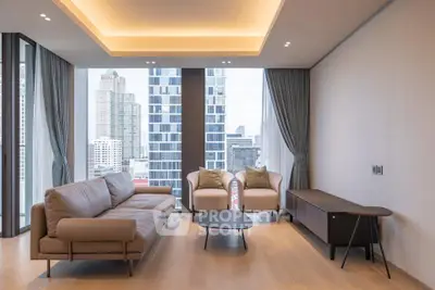 Modern living room with city view, elegant furniture, and floor-to-ceiling windows.