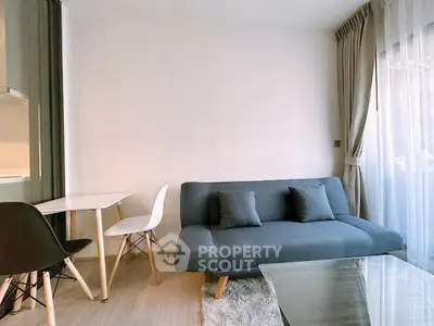 Modern living room with sleek furniture and natural light