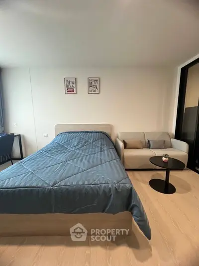 Modern bedroom with cozy bed and stylish decor in a contemporary apartment