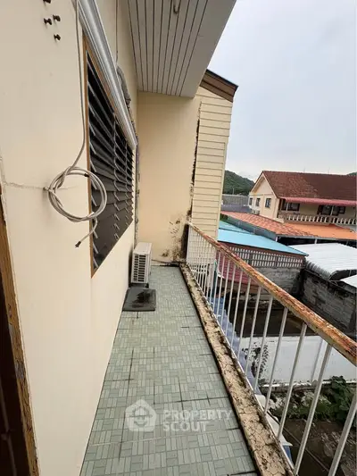 Charming balcony with scenic view, perfect for relaxation and enjoying the outdoors.