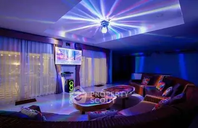 Luxurious living room with ambient lighting and modern entertainment setup