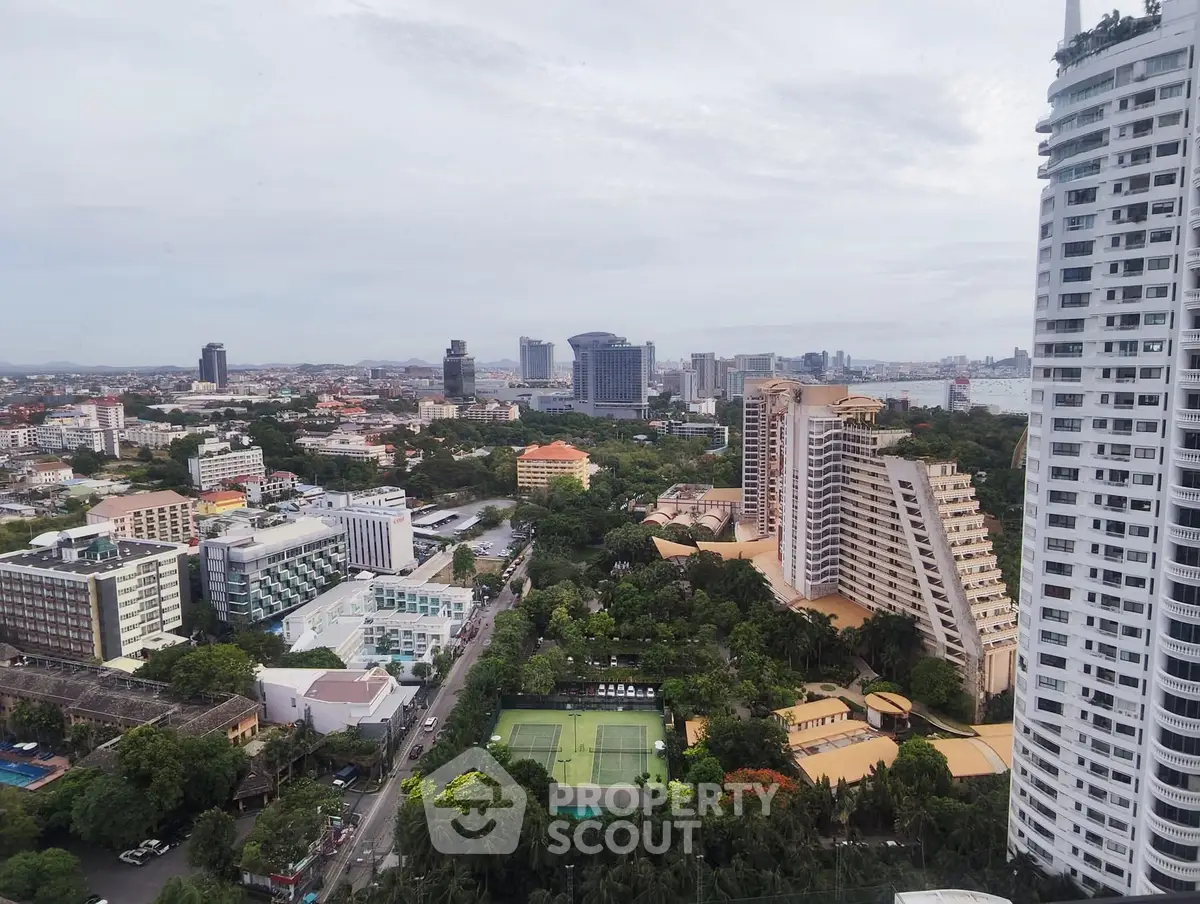 Stunning cityscape view with modern high-rise buildings and lush greenery