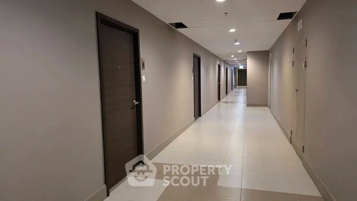 Modern apartment hallway with sleek design and neutral tones