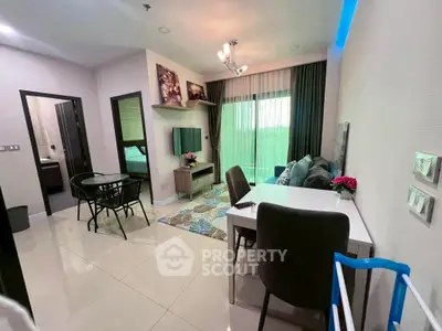 Modern living room with stylish decor and open layout in a contemporary apartment.