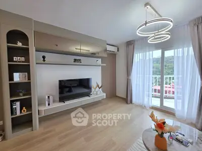 Modern living room with stylish decor and balcony view