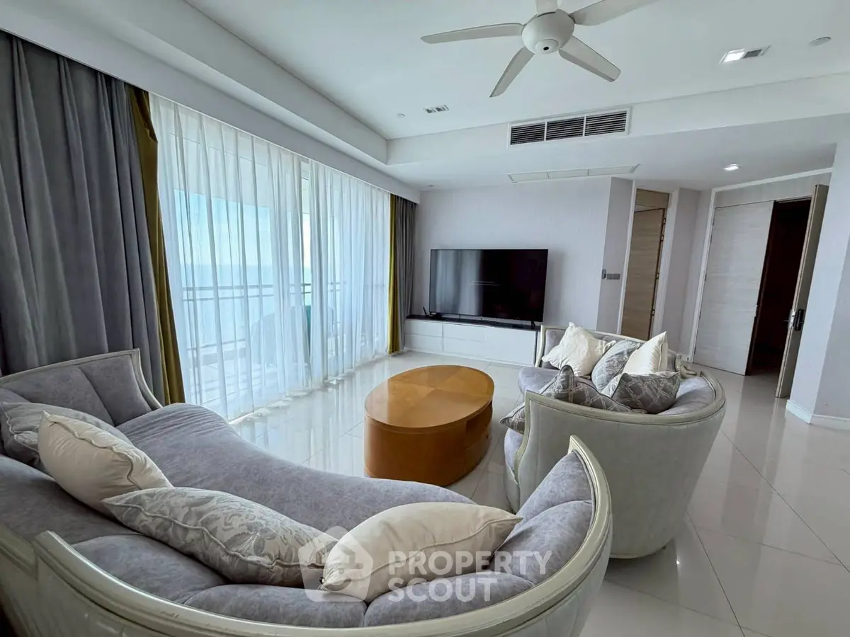 Luxurious living room with elegant furniture and stunning sea view