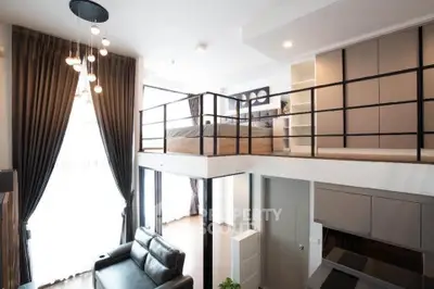Modern loft apartment with high ceilings and stylish mezzanine bedroom