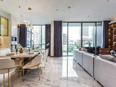 Luxurious open-plan living and dining area with city view, elegant furnishings, and marble flooring.
