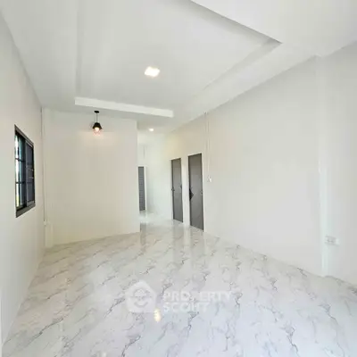 Spacious modern interior with marble flooring and minimalist design