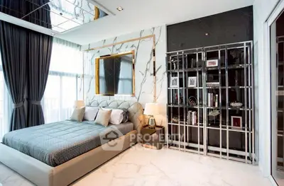Luxurious bedroom with elegant decor and floor-to-ceiling windows