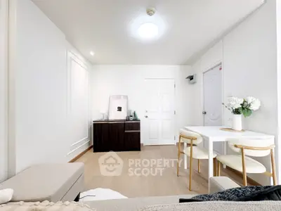 Bright and modern living room with minimalist decor and dining area