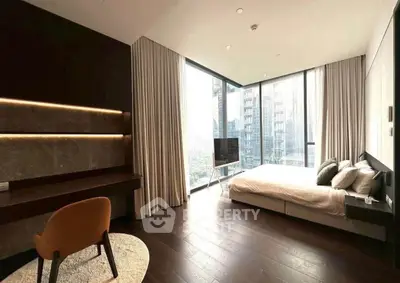 Luxurious modern bedroom with floor-to-ceiling windows and city view