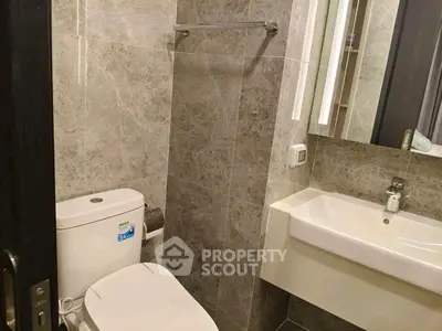 Modern bathroom with sleek fixtures and elegant tile design