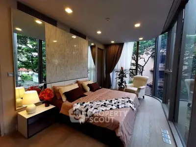 Luxurious bedroom with floor-to-ceiling windows and elegant decor in modern apartment.