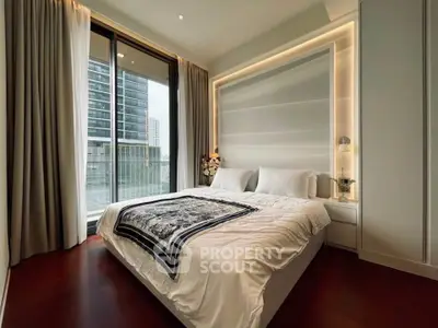 Luxurious bedroom with modern design and city view in high-rise apartment