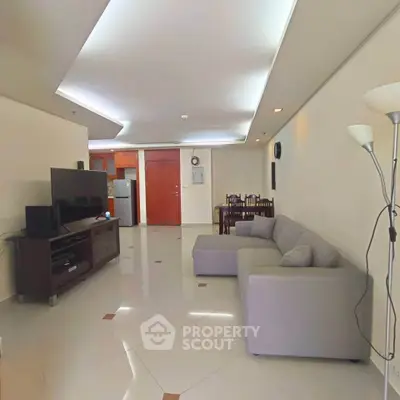 Spacious living room with modern furniture and sleek design