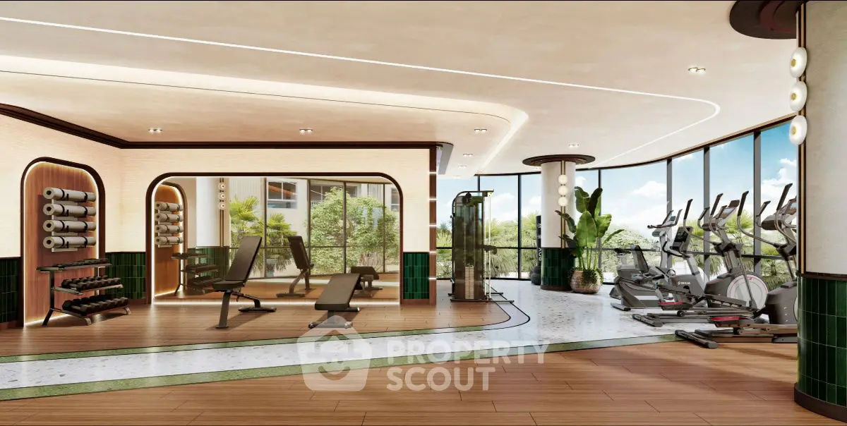 Luxurious gym with modern equipment and panoramic garden views.