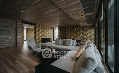 Luxurious modern living room with stylish decor and panoramic windows