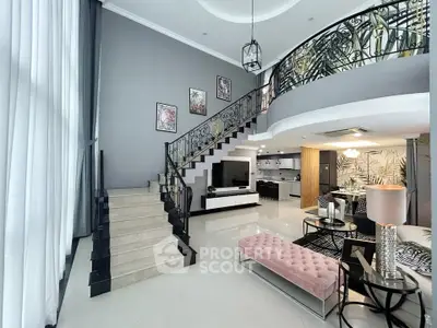 Luxurious modern living room with elegant staircase and stylish decor