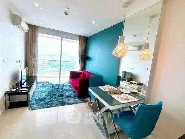 Modern living room with vibrant decor and dining area, featuring a large window with a scenic view.