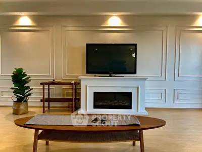 Elegant living room with modern TV setup and stylish decor