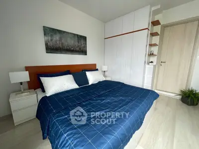 Modern bedroom with stylish decor and spacious layout
