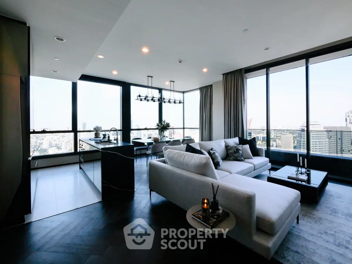 Luxurious modern living room with panoramic city views and elegant furnishings.