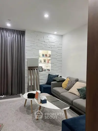 Modern living room with stylish decor and cozy seating area