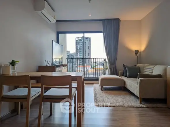 Modern living room with balcony view in urban apartment