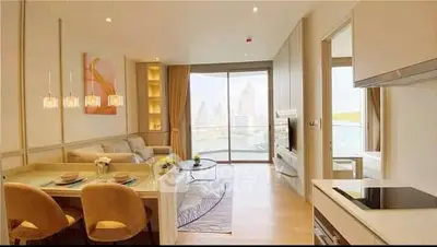 Luxurious open-plan living room with stunning city view and modern decor